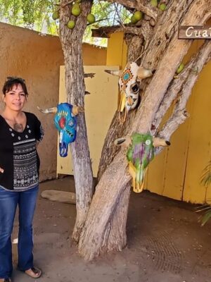 IMG_5286 Marcela Cinta’s finely crafted skulls adorn our Cualtecomate tree
